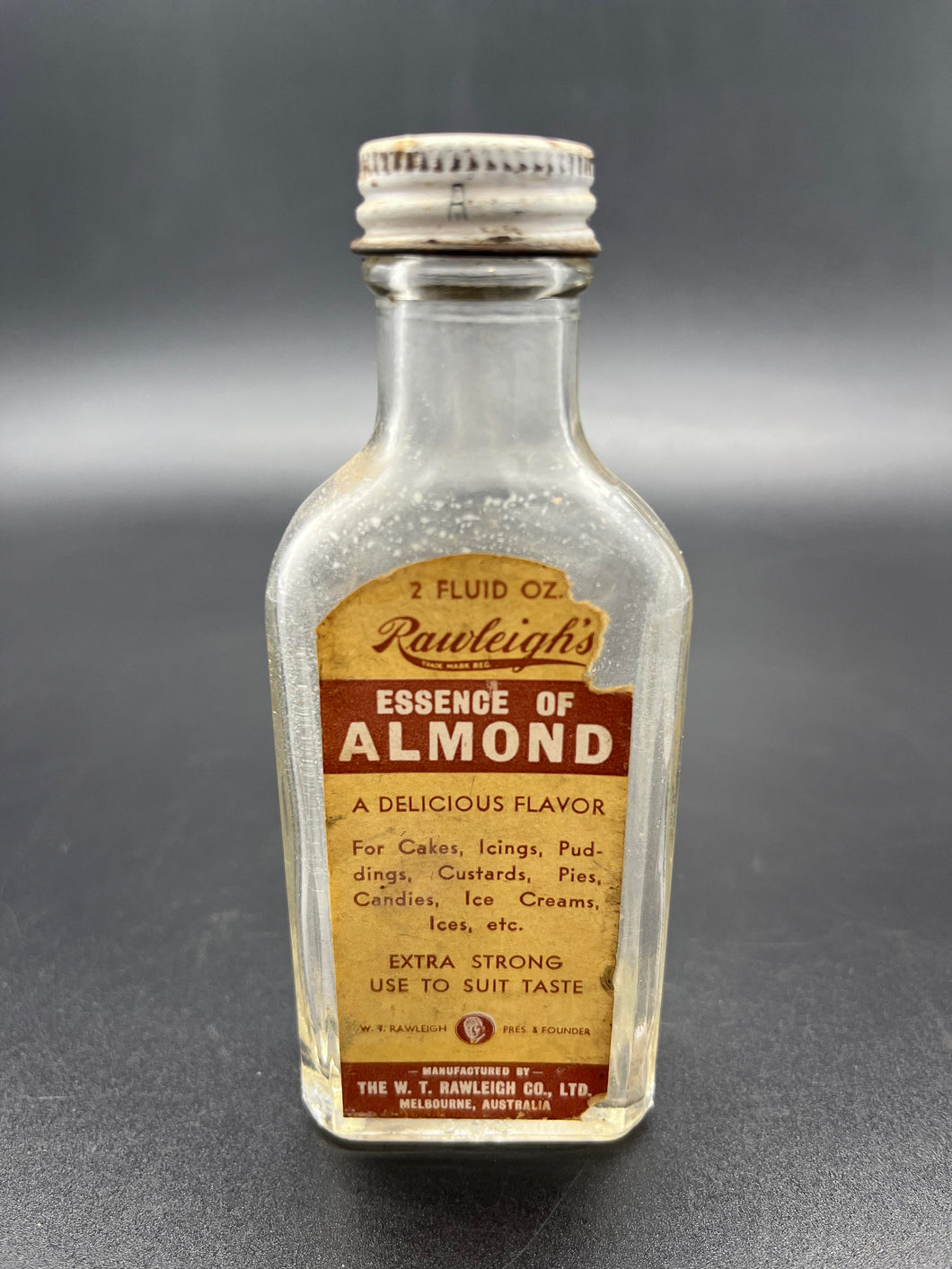 Vintage Rawleigh's Essence of Almond Bottle with Paper Label