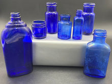 Load image into Gallery viewer, Blue Glass Bottle Lot of 7
