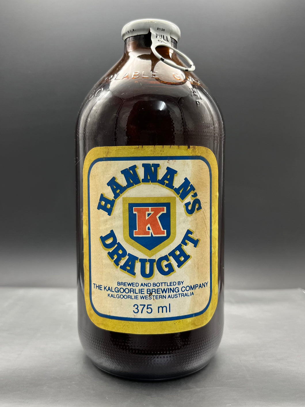 Hannans Draught Kalgoorlie Brewery Amber 375ml Rip Stubby Bottle - Full