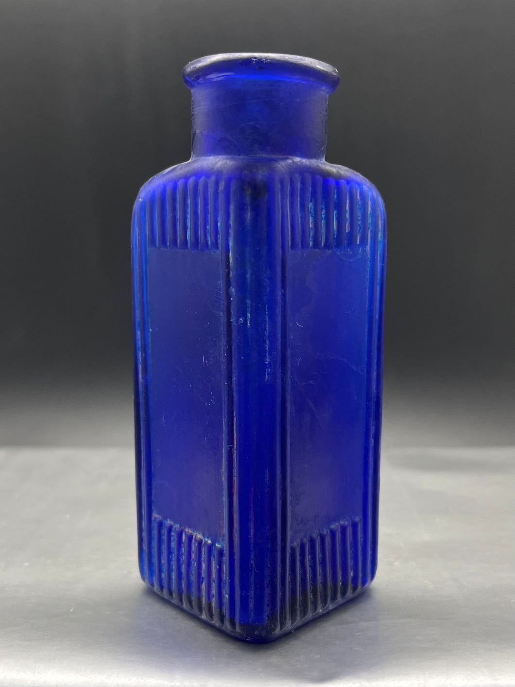 Small Blue Poison Bottle